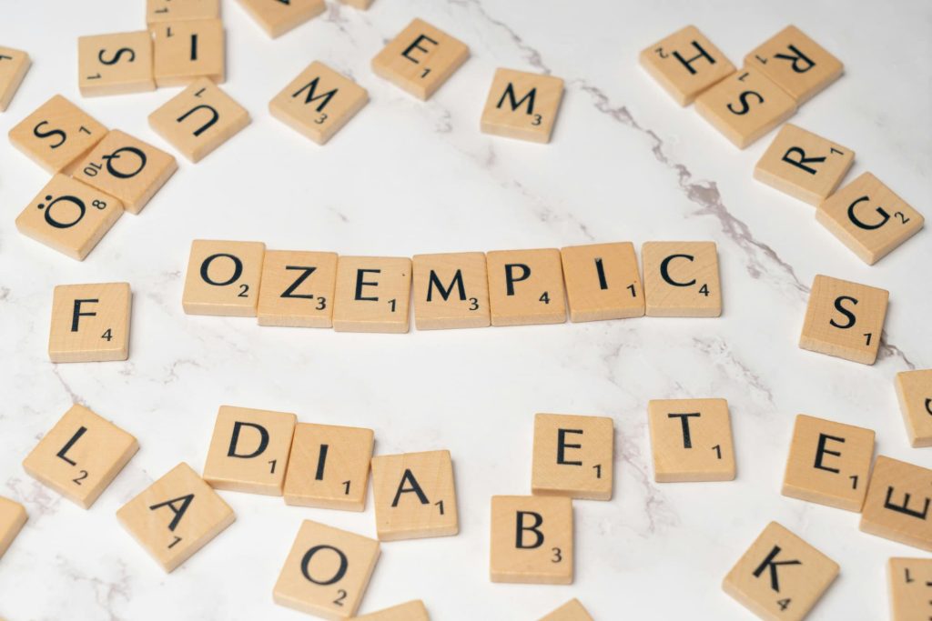 ozempic spelled out with letter tiles