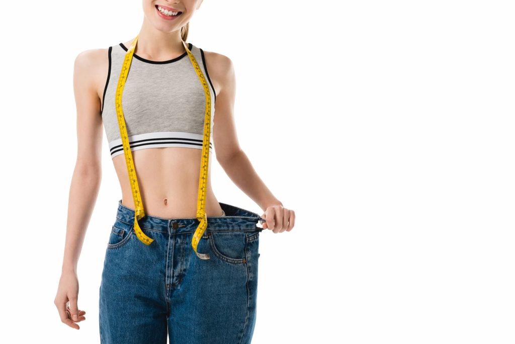 is ozempic safe for weight loss woman wearing old pants that are now too large